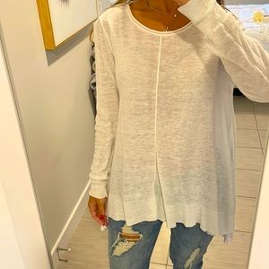 Super cute white shirt. I used it several times and loved it! Looks like new!